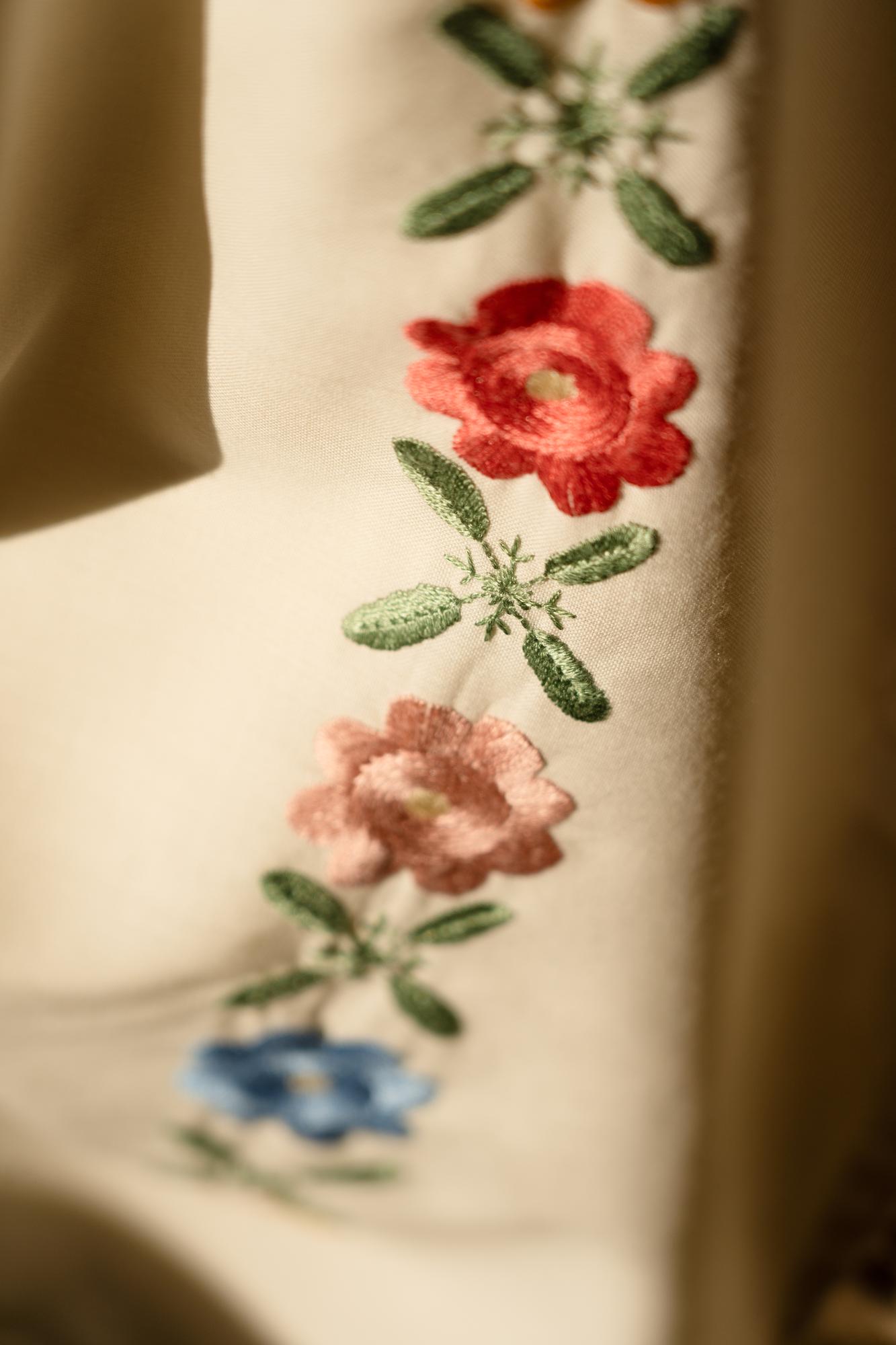Before-and-after restored embroidered linen